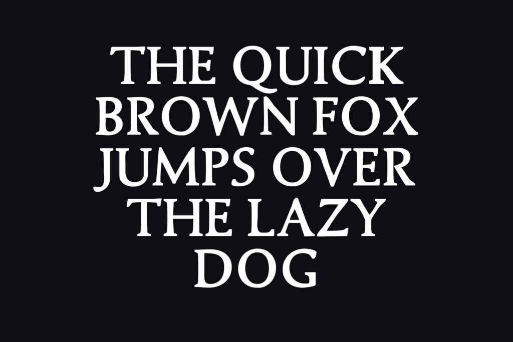 Elite Accents font sample displaying 'The Quick Brown Fox Jumps Over The Lazy Dog' in a bold, serif style against a black background.
