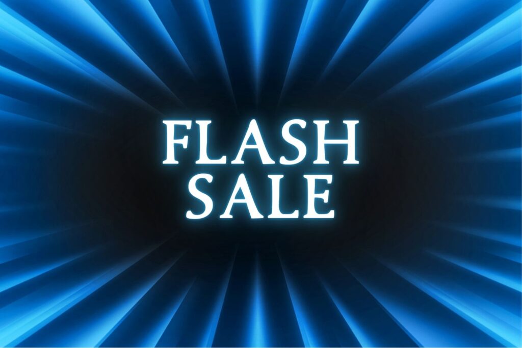 Elite Accents font used for the phrase 'FLASH SALE' in glowing white text against a radiant blue light burst background