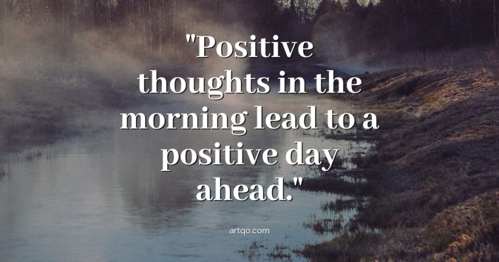 Text reading "Positive thoughts in the morning lead to a positive day ahead" is overlaid on a misty river landscape with trees in the background. Calm and serene.